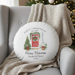 First Christmas in Our New Home – Red Door  Round Cushion<br><div class="desc">Cosy round throw pillow featuring a festive watercolor entry: classic red door with wreath and garland, potted trees with bows, and the arched headline “First Christmas in our New Home.” Personalise the names and year for a warm accent that suits modern or farmhouse décor. Perfect for sofa or entry bench...</div>