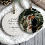 First Christmas Married Modern Minimalist Photo Ceramic Tree Decoration<br><div class="desc">Personalised “Our First Christmas Married” ornament with photo is a romantic keepsake perfect for newlyweds commemorating their first holiday season together. The front features elegant black typography with modern script and classic serif fonts on a clean white background, enhanced by a small black heart for a touch of warmth and...</div>