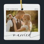 First Christmas Married Newlyweds Keepsake  Ceramic Ornament<br><div class="desc">Introducing the perfect Christmas ornament for newlyweds! This customisable ornament is the perfect way to celebrate your first Christmas together as a married couple. With a minimalist modern design and handwritten calligraphy, this ornament will look stunning on your tree. The best part? You get to customise it with a photo...</div>