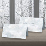 First Snowflakes Winter Wedding Elegant Modern Place Card<br><div class="desc">Featuring delicate snowflakes falling across your personalised place card details,  names and special wedding date on a winter frost background. Designed by Thisisnotme©</div>