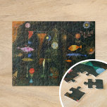 Fish Magic | Paul Klee Jigsaw Puzzle<br><div class="desc">Fish Magic (1925) by Paul Klee is a captivating abstract painting that blends colourful, dreamlike forms with a dark, mysterious background. The piece features stylised fish and other organic shapes that seem to float within a shadowy space, creating a sense of movement and fluidity. Klee's use of vivid, bright colours...</div>