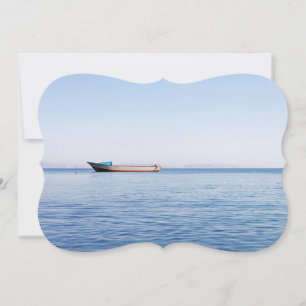 Fishing boat in a calm sea invitation