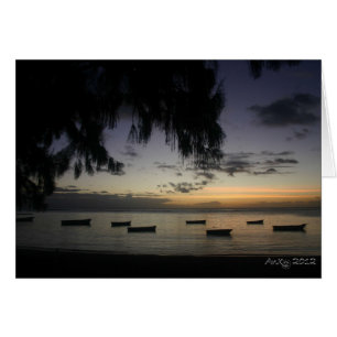 Fishing boats at sunset