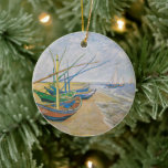 Fishing Boats | Vincent Van Gogh Ceramic Tree Decoration<br><div class="desc">Fishing Boats on the Beach at Saintes-Maries (1888) by Dutch post-impressionist artist Vincent Van Gogh. Original artwork is an oil on canvas seascape painting depicting several fishing boats on the ocean shore.

Use the design tools to add custom text or personalise the image.</div>