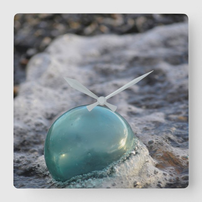Fishing Float Surrounded By Surf Square Wall Clock (Front)