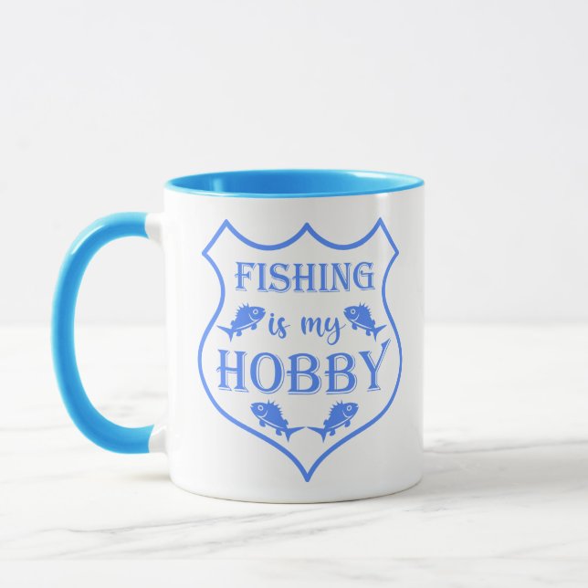 Fishing is my hobby shield quote on crest  mug (Left)