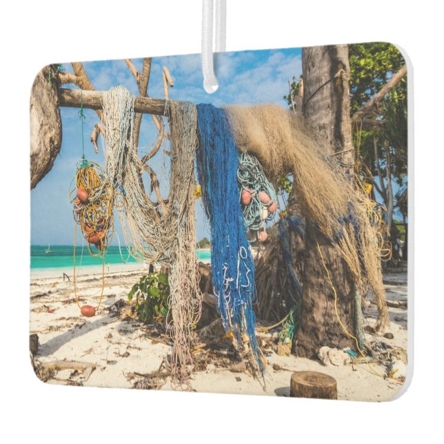 Fishing nets drying on the beach car air freshener (Left)