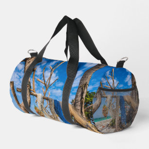 Fishing nets drying on the beach duffle bag