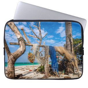 Fishing nets drying on the beach laptop sleeve