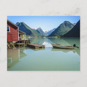 Fjord landscape with boathouse and mountains postcard