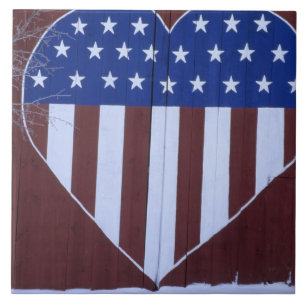 Flag in heart shape painted on barn after 9-11. tile