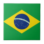Flag of Brazil, Brazilian Tile<br><div class="desc">The national flag of Brazil (Portuguese: Bandeira do Brasil) is a blue disc depicting a starry sky spanned by a curved band inscribed with the national motto, within a yellow rhombus, on a green field. Brazil officially adopted this design for its national flag on November 19, 1889, replacing the flag...</div>