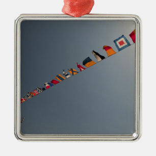 Flags fly over the deck of the USS Iwo Jima Metal Tree Decoration