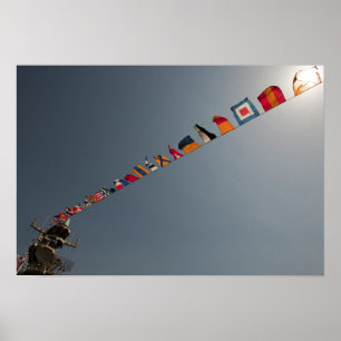 Flags fly over the deck of the USS Iwo Jima Poster