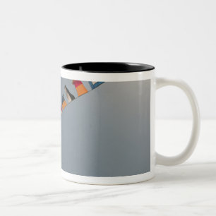 Flags fly over the deck of the USS Iwo Jima Two-Tone Coffee Mug
