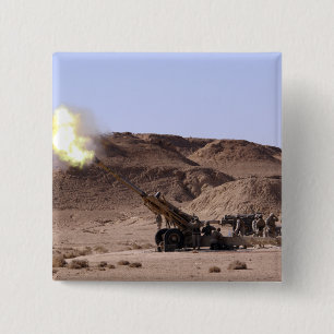 Flame and smoke emerge from the muzzle 15 cm square badge