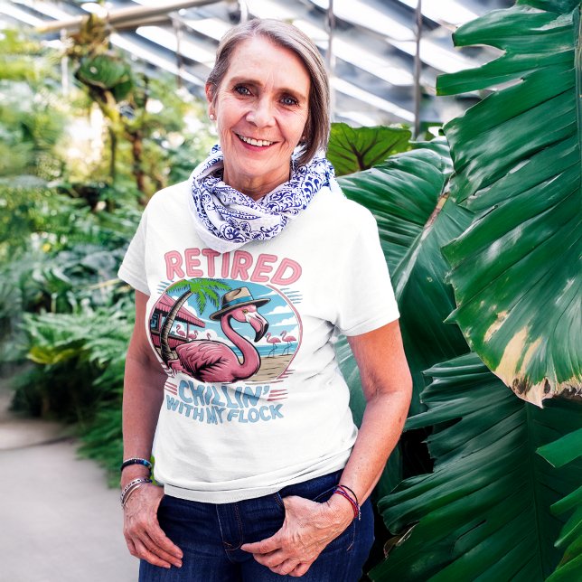 Flamingo Tropical Beach Retirement Humour T-Shirt (woman at botanical garden wearing funny flamingo retirement shirt that says chillin with my flock)