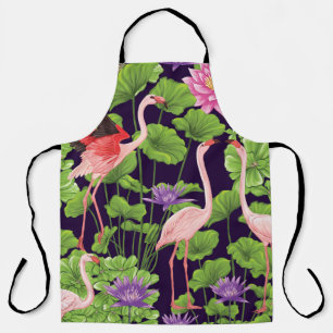 Flamingo, tropical plants, black background. apron