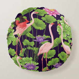 Flamingo, tropical plants, black background. round cushion