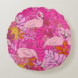 Flamingos on a background of tropical leaves and f round cushion