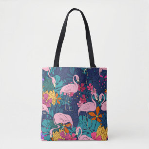 Flamingos on a background of tropical leaves and f tote bag