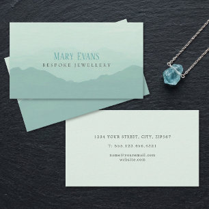 Flat painted green and blue mountains business card