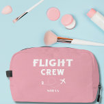 Flight Crew Pink and White Bachelorette Wedding Dopp Kit<br><div class="desc">Travel in style with our custom “Flight Crew” travel accessories! Featuring a blush pink background and a sleek airplane graphic and bold “Flight Crew” text, these items can be personalized with your name, family name, or custom text. Whether you’re preparing for a family vacation, a bachelorette party weekend, or a...</div>