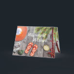 Flip Flops, Palm Tree, Christmas Lights Beach Holiday Card<br><div class="desc">This Warmest Wishes beach holiday greeting card features a cute pair of orange flip flops and sun hat. There are seashells and a watercolor palm tree decorated with Christmas tree string lights, all on a wooden background. Inside Greeting ~ "from my Holiday Paradise to yours... ". The greeting can be...</div>