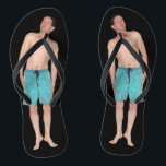 Flip Flops with tiny guy<br><div class="desc">(BLACK) Flip flops with a little man on the sole. The phrase is don't step on the little people on your way to the top... well maybe some have it coming LOL! Well positioned to have one eye looking up at you LOL! He is available on Zazzle on other products....</div>