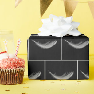Floating White Feather On Black Wrapping Paper