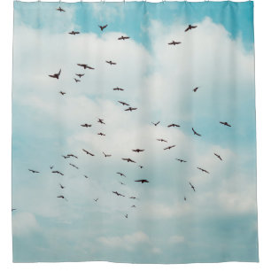Flock of grey dove fly on vintage blue sky. above, shower curtain