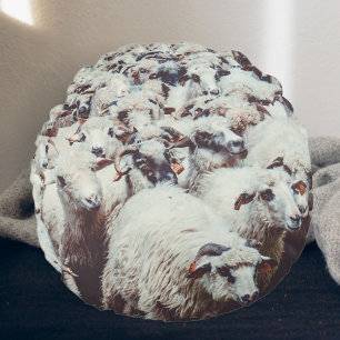 Flock of white & black sheep round cushion