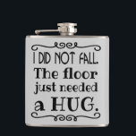 Floor Hug Funny Hip Flask<br><div class="desc">A funny flask to explain those awkward falls. Makes a great gift. You can change the grey background colour to another colour by selecting the "Customise It" button and choosing another background colour. Lighter colours work best with the black text image.</div>