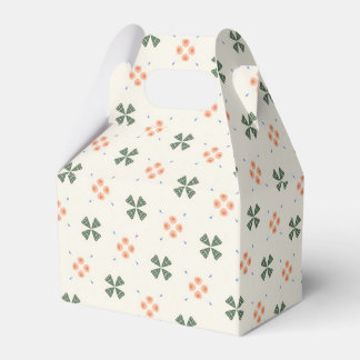 Floral and leafy geometric tile pattern on cream favour box