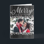 Floral & Berries Chalkboard Merry Christmas Photo Holiday Card<br><div class="desc">This elegant photo Christmas card features white accents of poinsettias, pine cones and pine branches with touches of red berries, all on a chalkboard background. Get "oohs and aahs" from family and friends this Christmas season when you send a unique and trendy greeting from DoodleLulu by 2 june bugs design!...</div>
