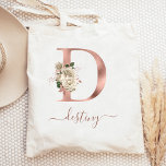 Floral Ivory Rose Gold Monogram Letter D Tote Bag<br><div class="desc">This elegant tote bag features a large letter "D" monogram in faux rose gold foil, decorated with a vintage ivory floral bouquet trimmed with green and rose gold foliage. Personalise it with her name in rose gold handwriting script, with flourishes at the beginning and end. Makes a perfect bridesmaid gift!...</div>