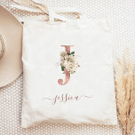 Floral Ivory Rose Gold Monogram Letter J Tote Bag<br><div class="desc">This elegant tote bag features a large letter "J" monogram in faux rose gold foil, decorated with a vintage ivory floral bouquet trimmed with green and rose gold foliage. Personalise it with her name in rose gold handwriting script, with flourishes at the beginning and end. Makes a perfect bridesmaid gift!...</div>
