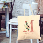Floral Letter M Watercolor Pink and Ivory Bouquet Tote Bag<br><div class="desc">Personalized tote bag with your monogram - name and inital. The floral letter M is designed in rose pink glitter and decorated with a pink and ivory bouquet of watercolor flowers and greenery. The template is set up for you to add your name in dusty pink hand lettered script. A...</div>