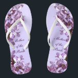 Floral Lilac Flowers Wedding Mother of the Bride Jandals<br><div class="desc">Lilacs are the theme of these elegant floral Mother of the Bride wedding flip flops with pink and mauve lilac flowers on a purple background.  The text can be customised for your special occasion.</div>