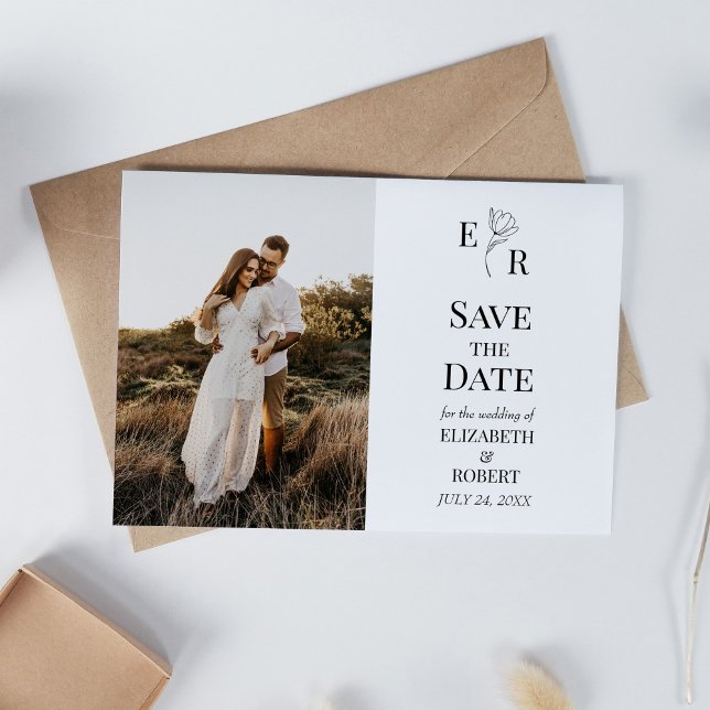 Floral Monogram Custom Photo Save the Date Card (Floral Monogram Custom Photo Save the Date Card on white table with dry wildflowers.)