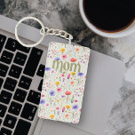 Floral Pattern Colourful Wildflower Soft Green Mum Key Ring<br><div class="desc">Keychain for mum with colourful wildflower pattern and bold modern green lettering on a soft green background,  The design features pretty wild flowers with "mum" lettered in ornate typography. Please browse my Mother's Day Wildflower Collection for more flowery cards and gifts.</div>
