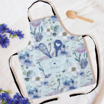 Floral Pattern Faux Stitched Pocket Spoon & Whisk Apron<br><div class="desc">Elegant floral Eiffel Tower pattern faux stitched front pocket apron. The design features an elegant blue and purple floral pattern with a faux front stitched pocket. A whisk and heart spoon are popping out from the faux front pocket. On the front of the pocket replace with your name. "Kitchen" is...</div>