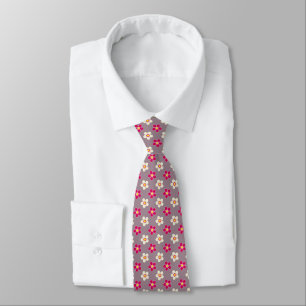 Floral pattern of crimson and white flowers on a c tie