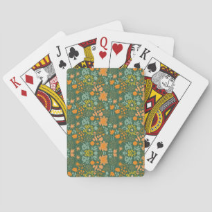 Floral pattern on a dark green background playing cards