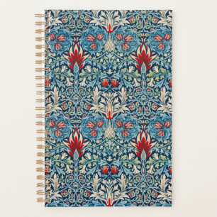 Floral pattern on green leaves blue background planner