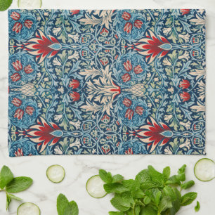 Floral pattern on green leaves blue background tea towel