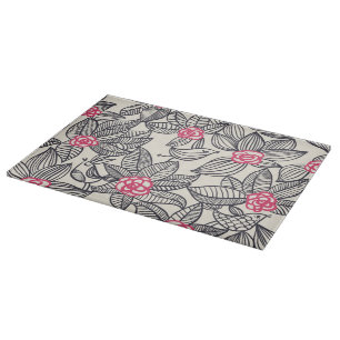 Floral pattern with cartoon birds cutting board