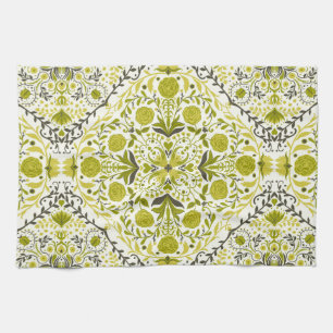 Floral tiles in green tea towel