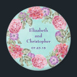 Floral Watercolor Wreath Pretty Wedding Magnet<br><div class="desc">A pretty wedding keepsake / commemorative or save the date magnet. A beautiful botanical themed illustration with a circular wreath of pretty watercolor flowers in pink and purple with green leaves in between. The floral design is made up of pink peonies and purple anemones. The background is a soft mint...</div>