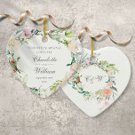 Floral Wedding Ornament Anniversary Ornamenent<br><div class="desc">Featuring a delicate watercolor floral garland,  this chic wedding or anniversary keepsake ornament can be personalised with your special anniversary message,  names and date. The reverse features a matching floral garland framing elegant monogram initials. Designed by Thisisnotme©</div>